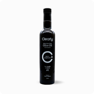 Clearly extra virgin olive oil bottle with a green label, showcasing a golden-yellow oil inside in a clear glass container