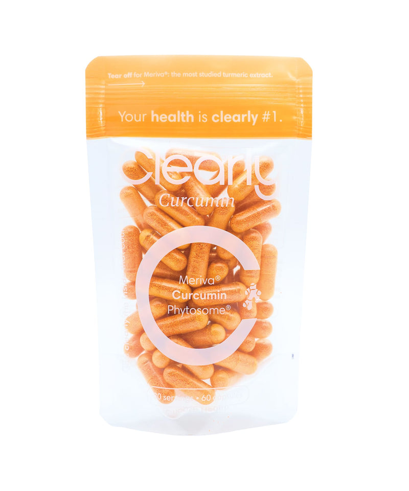 Clearly brand curcumin capsules in a bottle, showing the front label with supplement details and capsules inside.