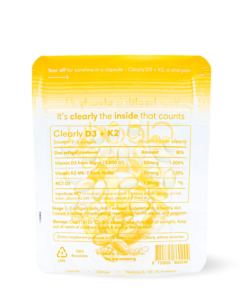 Clearly D3 + K2 supplement bottle with a close-up of the label showcasing the product name and dosage information.