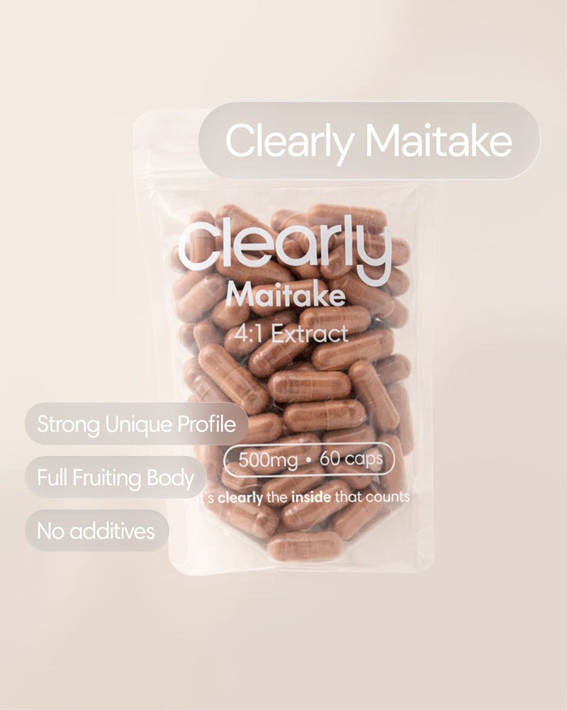 Fresh Clearly Maitake mushroom with textured brown cap and thick stems, displayed from the front view.